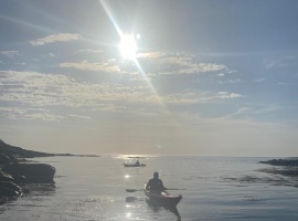 Kayakers in sunset, Barra